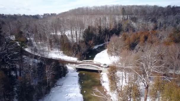 Winter Aerial Car Driving Bridge Dense Forest Landscape River Covered — Video Stock