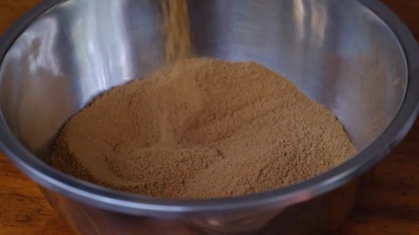 Pouring Cracker Crumbs Bowl Preparing Bake Banoffee Pie Close — Vídeo de Stock