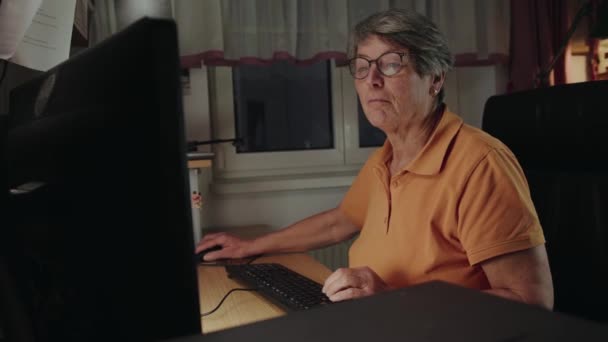 Mature Woman Working Her Computer Checking Writing Emails — Stock Video