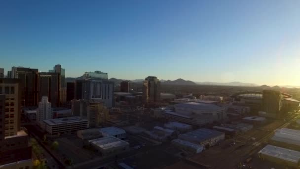 Aerial Shot Zooming Away Phoenix Arizona Skyline Morning Sun Peaking — Stockvideo