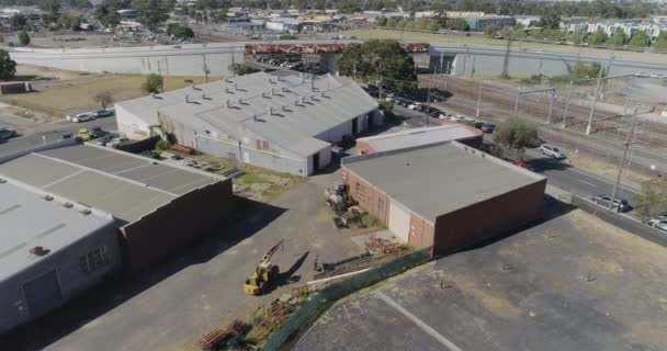 Smooth Aerial Tracking Shot Yellow Crane Site Yard While Transport — Stok video