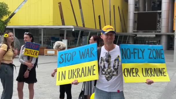 Gentleman Holding Sign Stating Stop War Ukraine Fly Zone Airspace — Stock Video