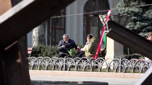 Women Sit Talking Bench Tank Traps Made Welded Steel Metal — Stok Video