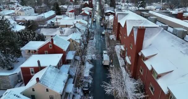 Town Usa Winter Snow Tilt Aerial Reveal Red Brick School — Stock Video