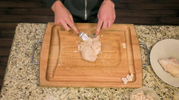 Caucasian Male Shredding Skinless Steamed Chicken Breast Forks Wooden Cutting — Wideo stockowe