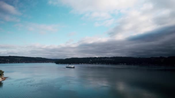 Commuter Ferry Slowly Approaches Calm Reflecting Water Blue Skies Dark — стоковое видео