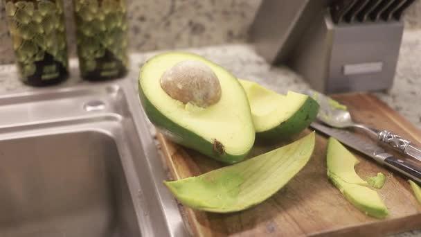 Fresh Avocado Halves Seed Kitchen Counter — ストック動画