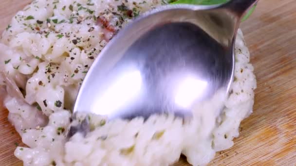 Spoon Taking Risotto Portion Wooden Board Macro Shot Close View — Stockvideo