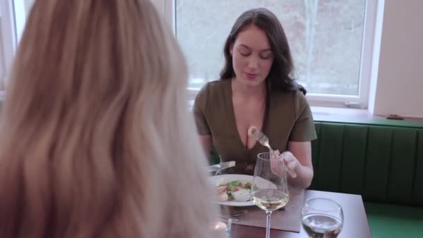 Young Woman Enjoying Tasty Meal Lunch Her Girlfriend Fancy Restaurant — Wideo stockowe