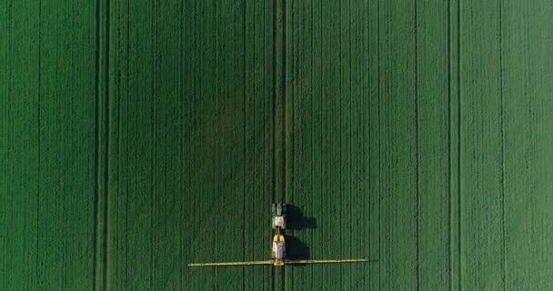 Tractor Farms Green Field Overhead Drone Shot — Vídeo de stock