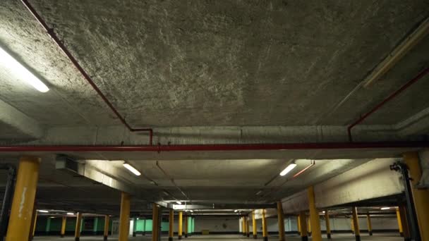 Empty Underground Car Park Night Vehicle Spots Parking Lot — Wideo stockowe