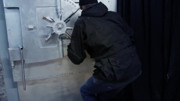 Bank Robber Breaks Bank Vault Opens Safe Door — ストック動画