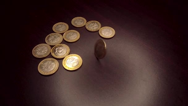 Pesos Coin Spinning Hand Wooden Table Abundance Wealth Concept Slow — Stock video