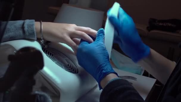 Nail Saloon Woman Receiving Manicure Nail Grinding Polishing — стоковое видео