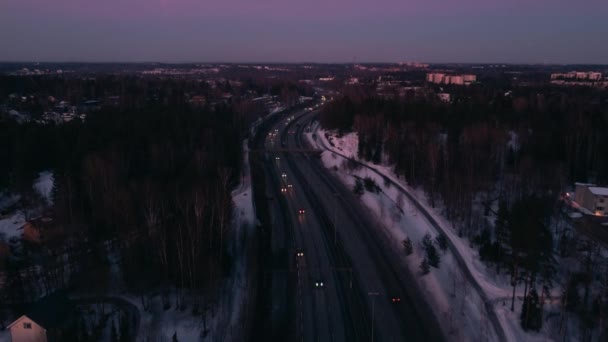 Highway Traffic Rural Snowy Area Finland Rising Forward Aerial — Wideo stockowe