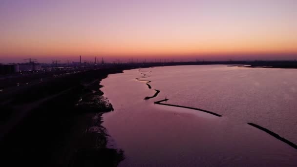 Aerial Calm Waterway Reflected Orange Sunset Colours Next Silhouetted View — 비디오