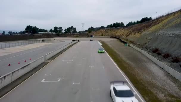 Porsche 911 Nissan Gtr Bmw Entering Main Straight Race Circuit — Video Stock