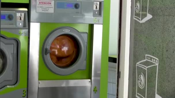 Slow Motion City Laundromat Reflections Door — Video