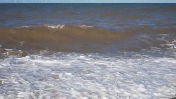 Rolling Waves Breaking Pebble Beach Shore Spraying Sea Foam — Stock Video