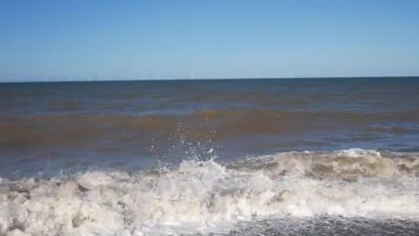 Rolling Storm Waves Crashing Pebble Beach Shore Spraying Sea Foam — Video