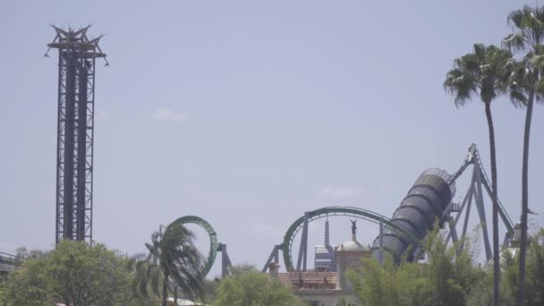 Epic Shot Roller Coaster Shooting Out Tunnel Twists Turns While — Vídeos de Stock