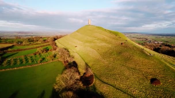 Aerial 360 Drone Flying Base Glastonbury Tor Michael Tower Hillside — Stockvideo