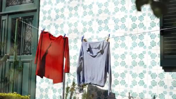fresh clean cloth hang up on traditional Portuguese house in the old city center of porto city in Portugal