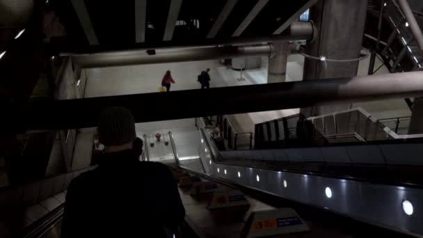 Pov Standing Male Commuter Wearing Beanie Going Escalator Westminster Station — Stockvideo