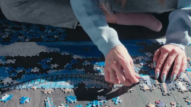 Close Young Woman Long Nails Hands Assembling Puzzle Pieces Putting — Vídeo de Stock