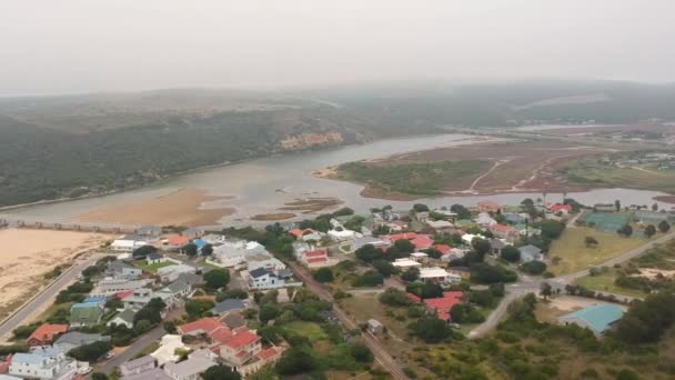 Aerial Pan Shot Tropical Lagoon Draining Ocean — Vídeo de Stock