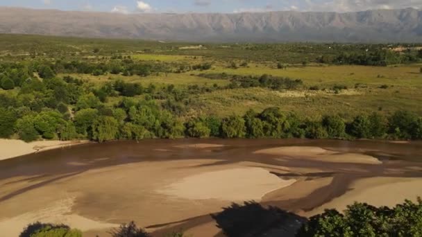 Dry River Green Banks Mountains Background Cordoba Argentina Aerial Panoramic — Video Stock
