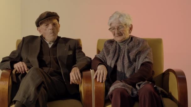 Elder Couple Interview Sitting Next Each Other — Stockvideo