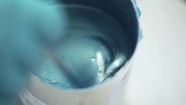 Metallic Blue Paint Mixed Together Small Container Form One Paint — Stockvideo