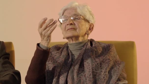 Elderly Woman Touching Her Hair Holds Her Husbands Hand — 비디오