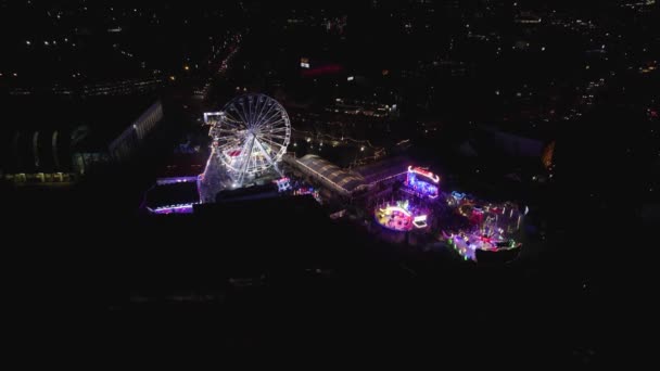 Aerial Ascending Shot Colourful Winter Wonderland Fairground Ferris Wheel Night — Stock video