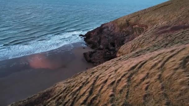 Aerial Slow Dolly Beach Coastal Cliffs Blue Pool Bay Drone — Vídeo de stock