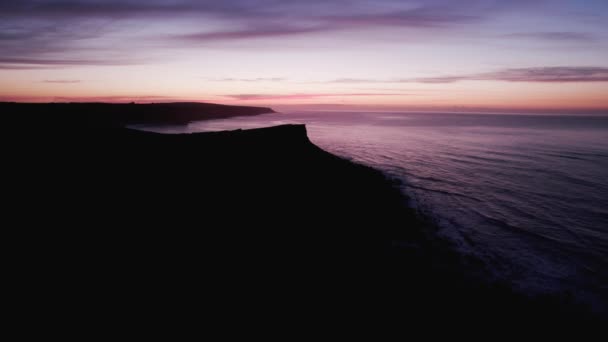 Aerial Flying Shot Dark Silhouette Coastline Sunrise Rhossili Gower Drone — Stock Video