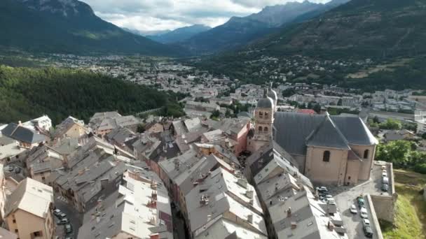 Nice Old Village Old Church Bottom Forested Hill Aerial Shot — Stockvideo