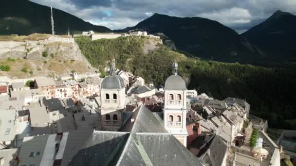 Nice Old Village Old Church Bottom Forested Hill Aerial Shot — Vídeo de Stock