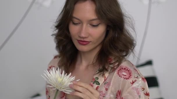 Girl Winked Flower Her Hands — Vídeo de Stock