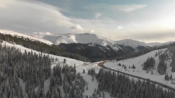 Aerial Winter Parking Lot Mountain Pass Ski Tracks Snow — стоковое видео