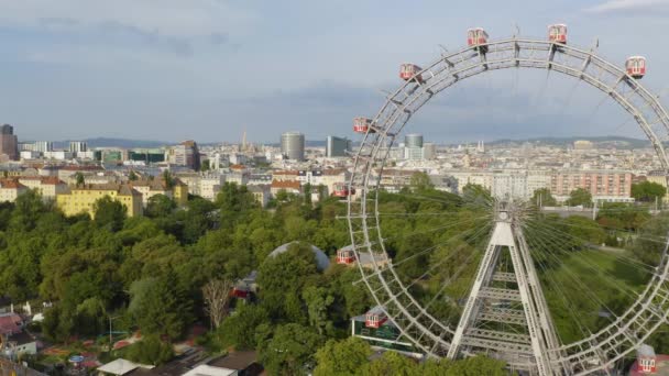 Viennese Giant Ferris Wheel Rotating Fixed Drone Shot — стоковое видео