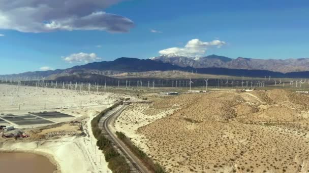 Drone Flies Train Tracks Windmill Farm Palm Springs San Bernardino — Vídeo de Stock