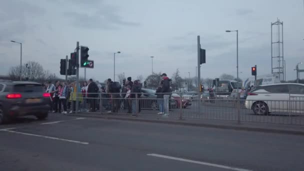Football Fans Waiting Cross Road — Stock Video