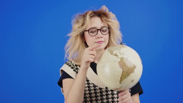 Student Blonde Girl Observing Finding Country Earth Globe While Transmitting — Video