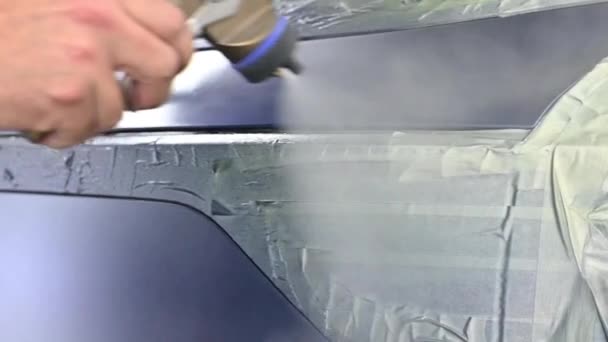 Spraying Varnish Back Blue Vehicle Particles Falling Slow Motion View — Stockvideo