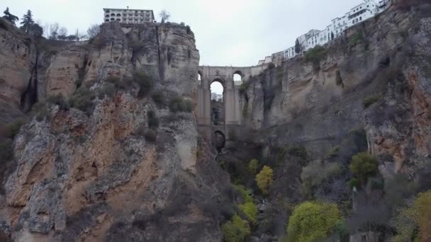 Retreating Aerial Reveals Guadalevin River Gorge Splitting Ronda Spain — стоковое видео