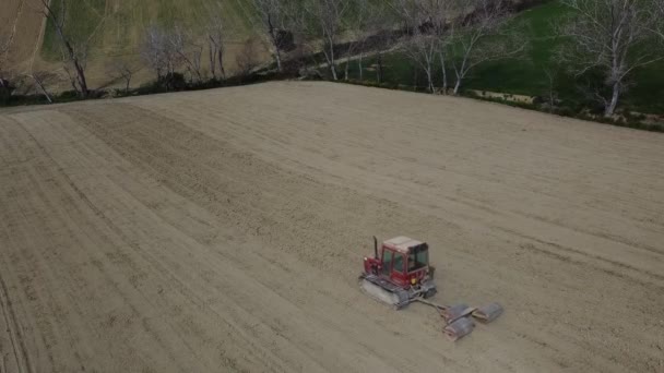 Red Crawler Tractor Pull Triple Roll Machine Preparing Soil Agricultural — Vídeo de Stock