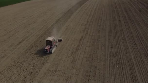 Aerial View Red Tractor Plowing Preparing Land Scenic Agricultural Farm — Stock Video
