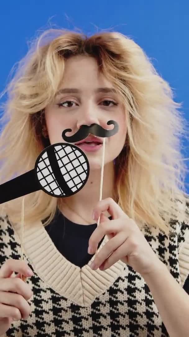 Vertical Female Comedian Making Jokes Mustache Microphone Prop — Stock Video